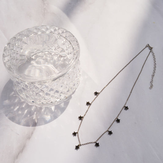 Collar mil estrellas negro y plata